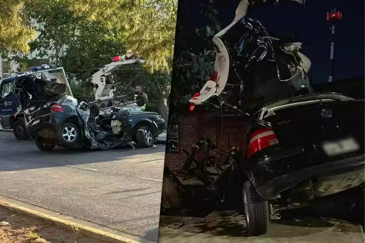 Un coche negro gravemente dañado es levantado por una grúa en una calle, rodeado de árboles y un vehículo de emergencia en Godoy Cruz, Mendoza.