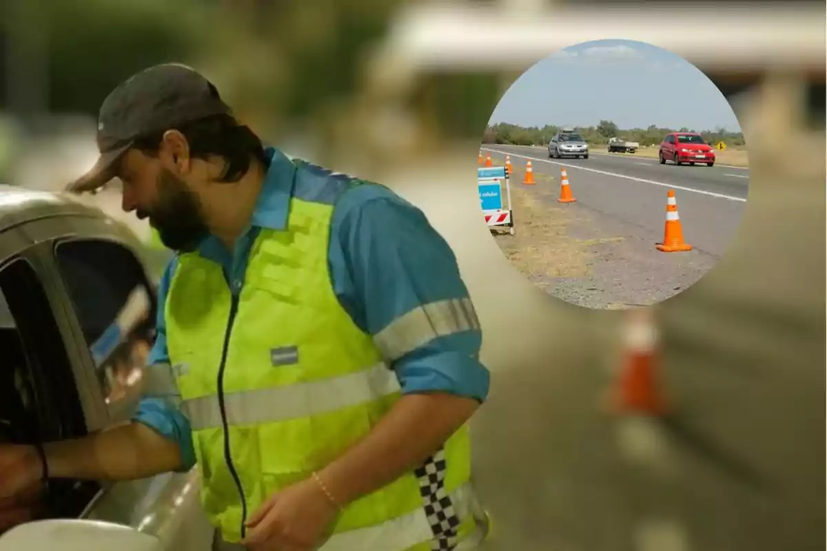 Un hombre con chaleco reflectante interactúa con un conductor en un control vehicular mientras varios conos naranjas están colocados en la vía, representando los controles durante Navidad, Nochebuena y el Verano del 2024 en Argentina.