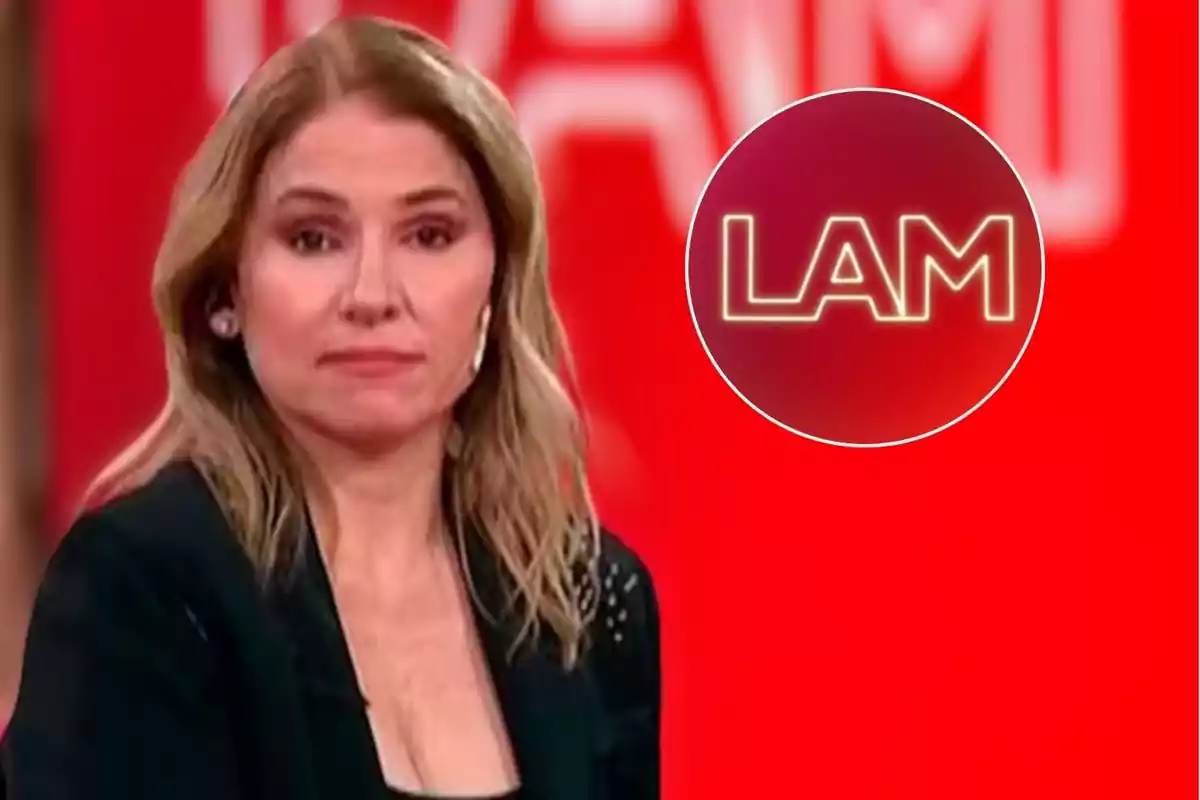 Mujer con cabello rubio y expresión seria en un fondo rojo con el logo de LAM.