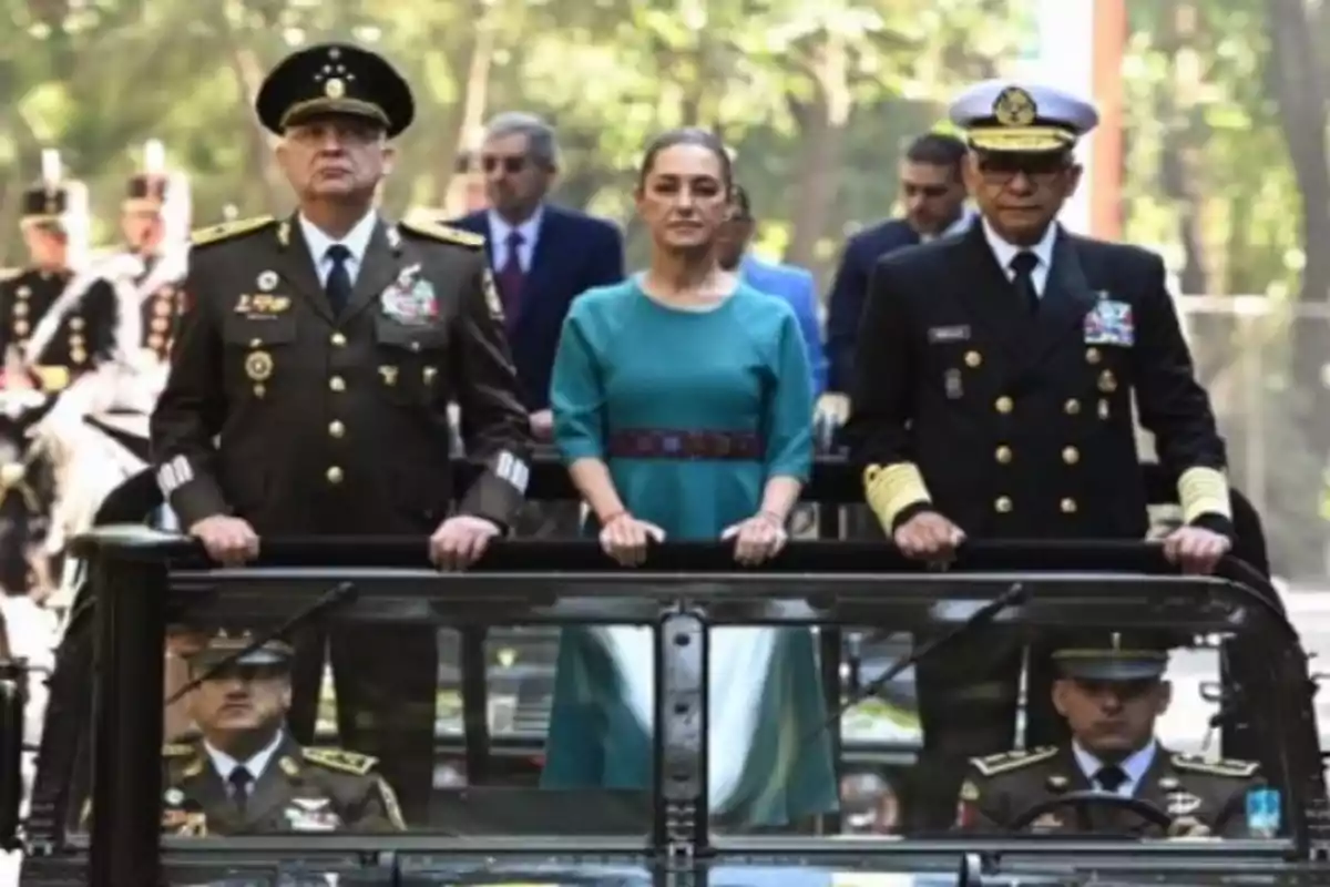 People in military uniform and a woman in a convertible during an official event.