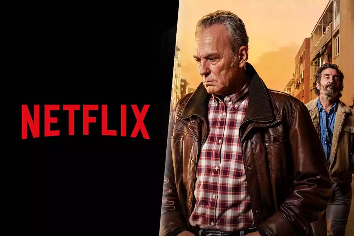 Imagen promocional de una serie de Netflix "Entrevías" con dos hombres en primer plano, uno con chaqueta de cuero y camisa a cuadros, y otro con chaqueta clara, en un entorno urbano al atardecer.